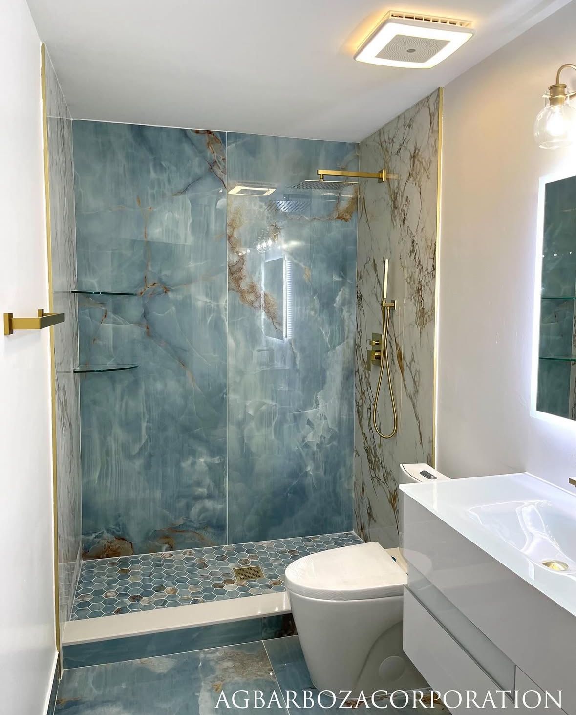 Luxury bathroom renovation with gold fixtures